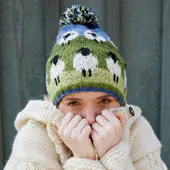 Pachamama Knitwear - hand-knitted - 100% wool - bobble beanies, handwarmer gloves, headbands, sofa|long socks, legwarmers - fairly traded - UK|International delivery.