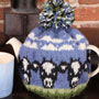 Pachamama Knitwear Dairy Cow Tea Cosy in-situ