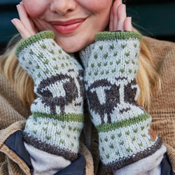 Pachamama Herdwick Sheep Handwarmer Oatmeal. Pachamama fingerless gloves  are knitted in Nepal by local villagers using local wools and natural dyes to UK designs. These Herdwick Sheep handwarmers are fleece lined to keep your hands extra warm.