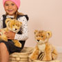 Teddy Hermann Baby Lion Sitting 27cm Soft Toy in situ