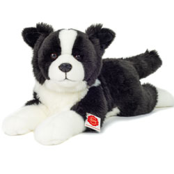 Teddy Hermann Border Collie Dog Lying 45cm soft toy. Coming in a soft black and white fur body with white tipped tail, black cupped ears, black tasteful plastic Border Collie nose and adorable cute looks.