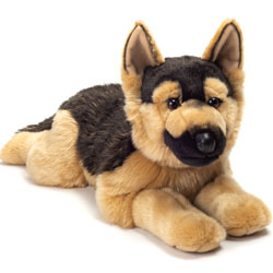 Teddy Hermann German Shepherd Lying 60cm Soft Toy. This absolutely gorgeous Alsation dog comes in a rich dark brown and soft tan fur body, with a two coloured tail, beautifully lined upright ears, a soft leatherette nose and perfect proportions. This is o