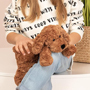 Teddy Hermann Lying Brown Dog Soft Toy 28cm holding