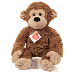 Teddy Hermann Ricky Monkey Plush Soft Toy 32cm'. Coming in a  ruffled mid-brown fur body with tan-brown hands, feet, face and ears, a black button nose, smiley face and the most adorable cute looks.