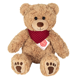 Teddy Hermann Teddy Curtis with Scarf 30cm Plush Soft Toy coming in a sandy-brown, ruffled fur body with dark-brown paw prints and button nose, glossy brown safety eyes and a fetching red polka-dot neckerchief.